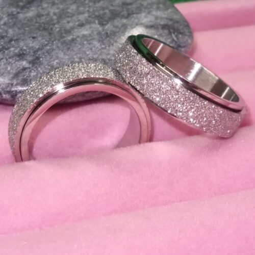 Ohut pyörivä glitter fidget sormus hopea